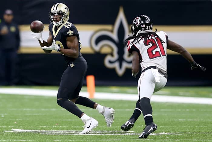 New Orleans Saints receiver Michael Thomas (13) makes a catch past Atlanta cornerback Desmond Trufant (21). Mandatory Credit: Chuck Cook-USA TODAY Sports
